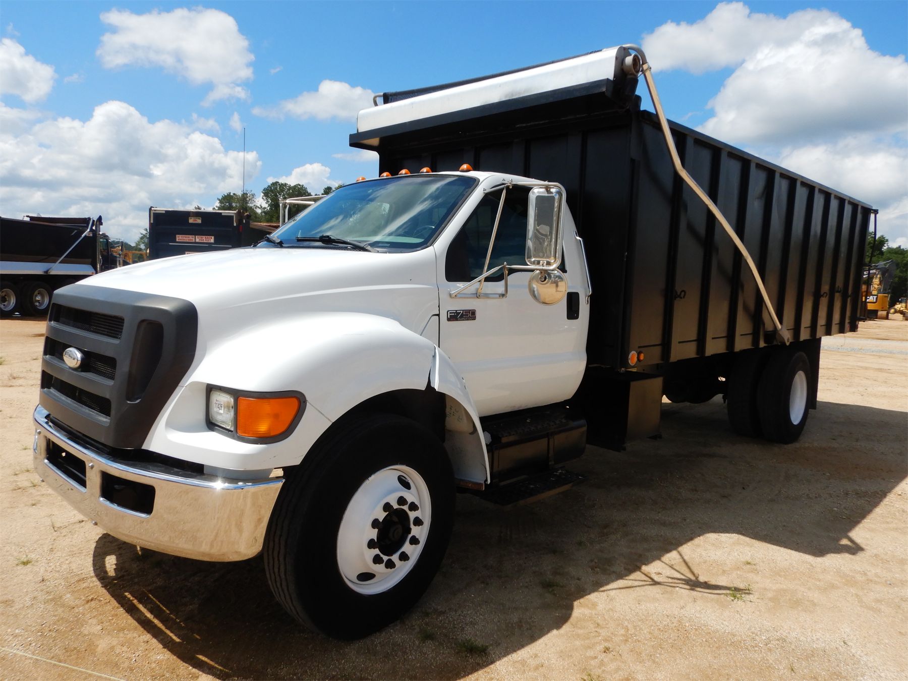 2009 FORD F750 Dump Truck J.M. Wood Auction Company, Inc.