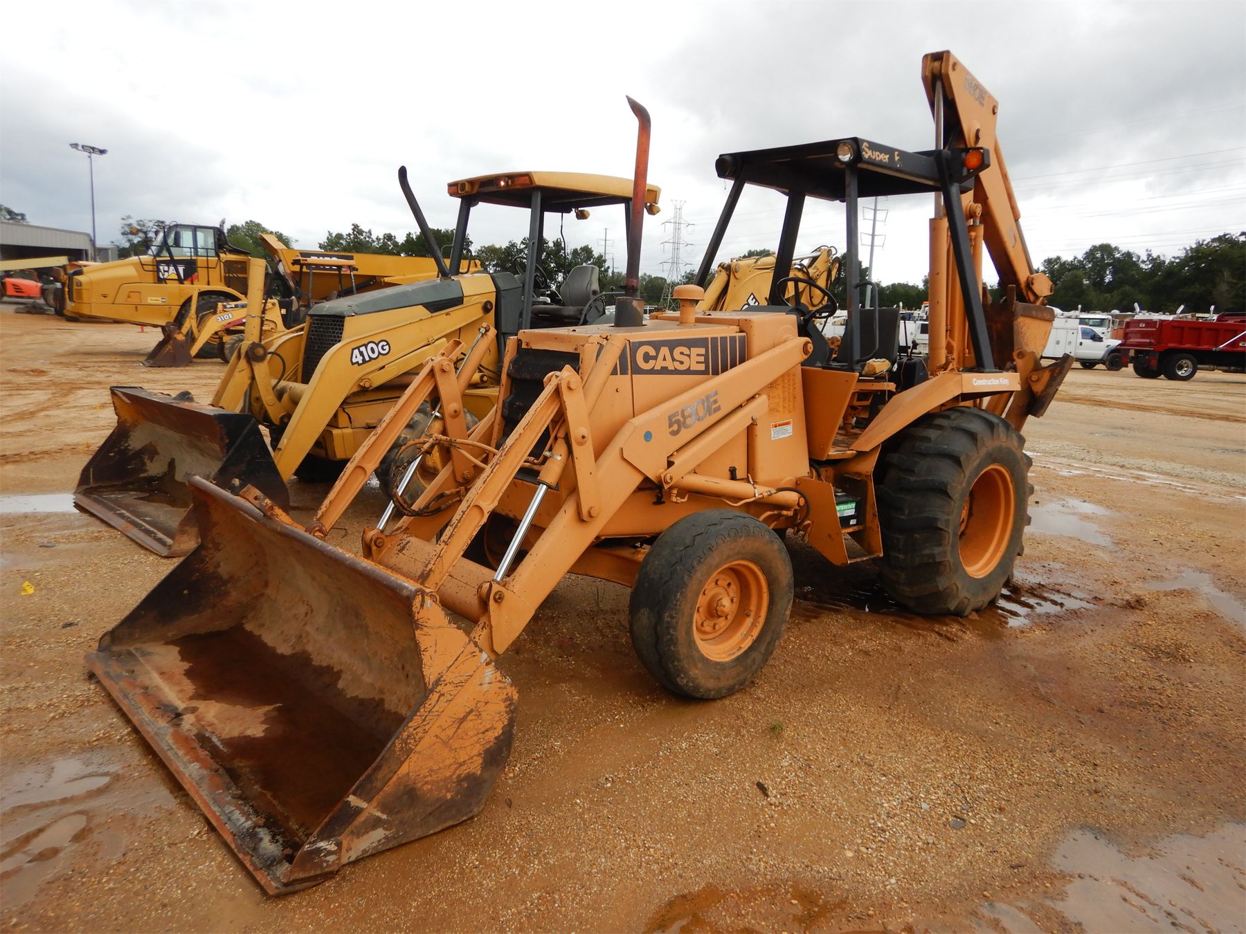 CASE 580E Backhoe J.M. Wood Auction Company, Inc.