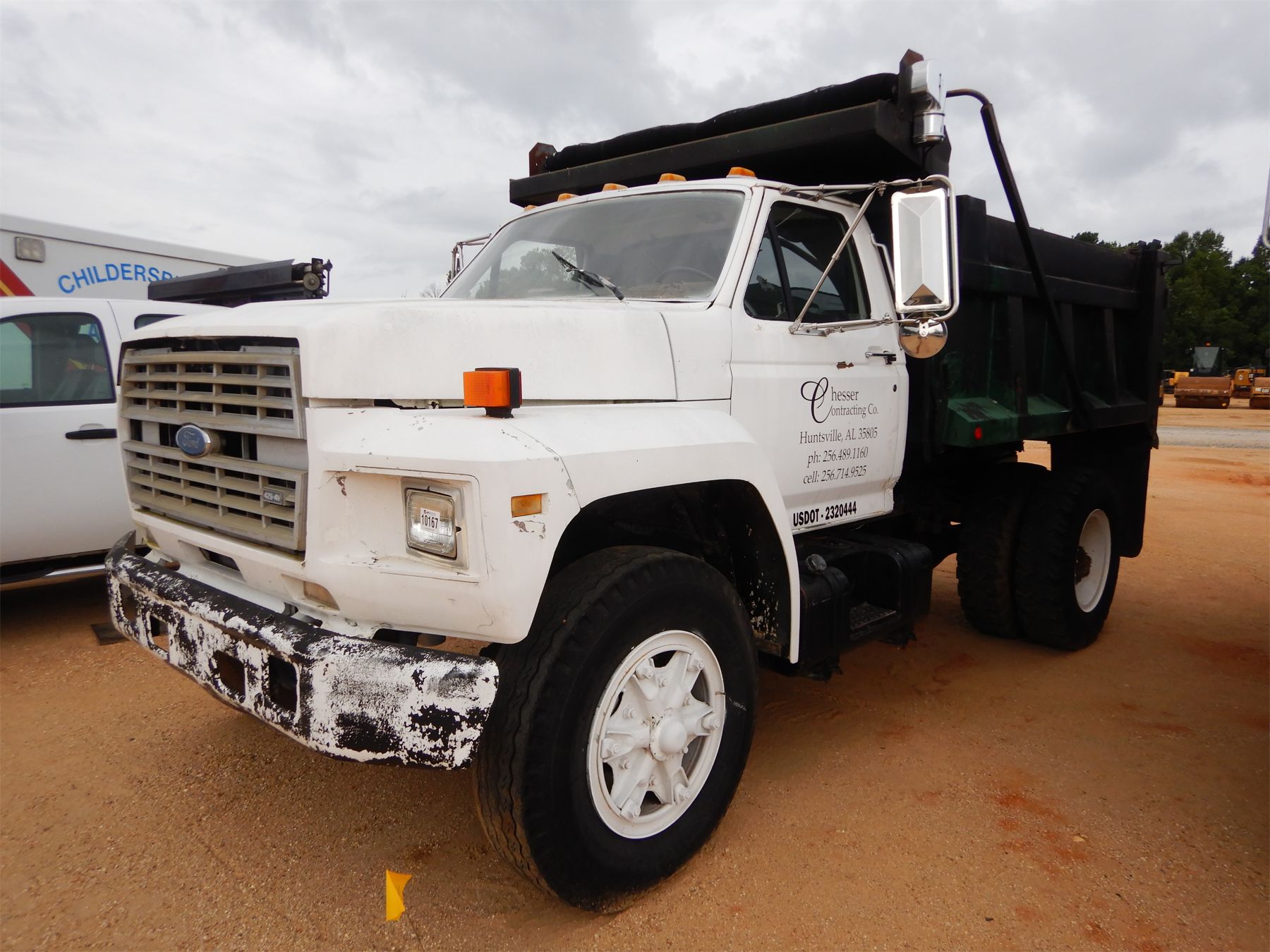 1990 FORD F700 Dump Truck J.M. Wood Auction Company, Inc. 1990 FORD F700 Dump Truck J.M. Wood Auction Company, Inc.