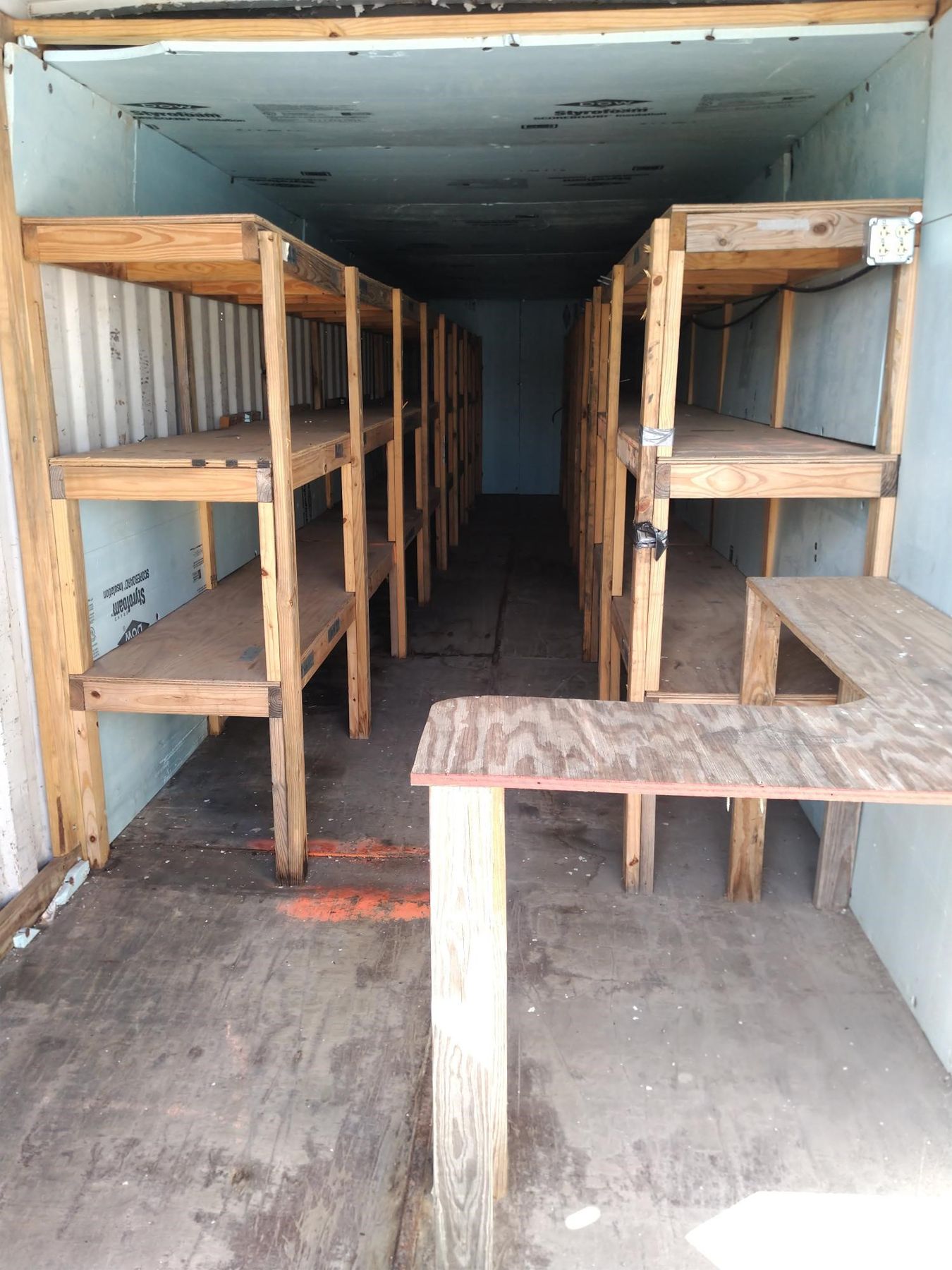 40' Conex wooden shelves Miscellaneous J.M. Wood Auction Company, Inc.