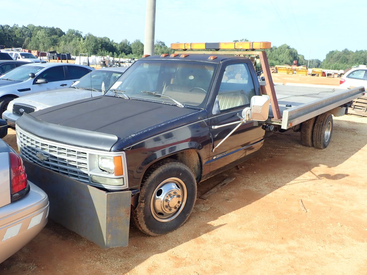 1990 CHEVROLET 3500 Rollback Truck J.M. Wood Auction Company, Inc.