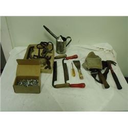 leather pouch, axe head, hammer, bolts, 2 draw knives, oil can with spout