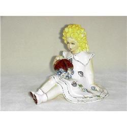 Seated Figure with Flowers #957475