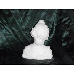 Sculpture of a young girl  #957497