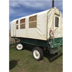 Tarp covered wagon, bench seats, zippered opening