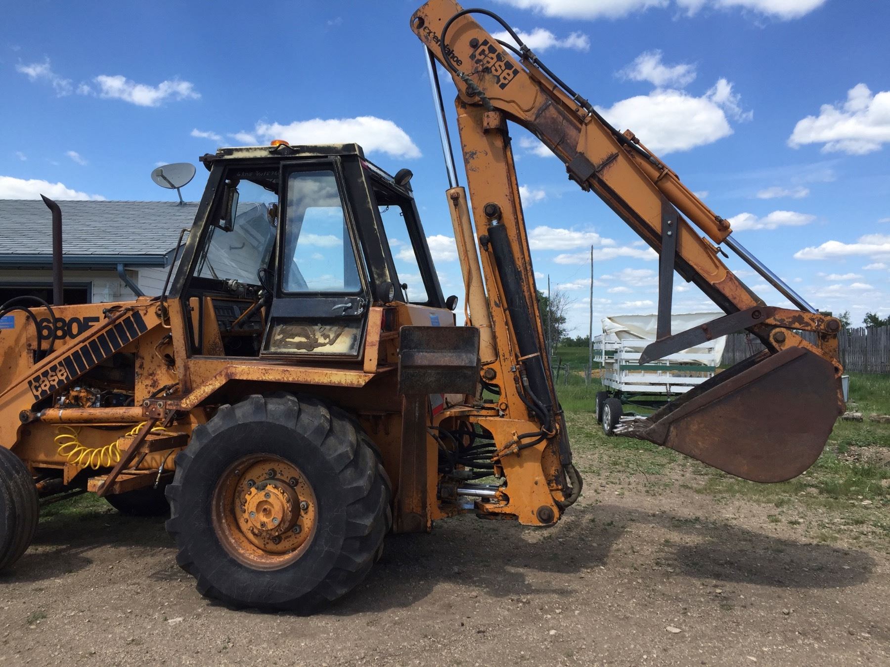 1976 Case 680E Extendahoe, Chescu Auctions