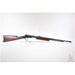 Non-Restricted rifle Winchester model 90, .22 WRF twelve shot pump action, w/ bbl length 23  [Round 