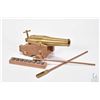 Image 1 : Two miniature brass cannons on wooden with wooden carts, cannon balls and tamper rods etc. largest w