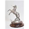Image 1 : Limited edition Colt Firearms pewter "Rampant Colt" figure circa 1982 on wooden base, 6 3/4" in heig