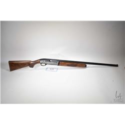 Non-Restricted shotgun Ithaca model XL 900, 20 gauge 3" four shot semi automatic, w/ bbl length 28" 