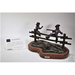 G.C. Wentworth "Pa's Buffalo Gun" cast bronze sculpture with cold painted ground cover on wooden bas