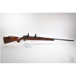 Non-Restricted rifle Weatherby model Mark V, 7mm Magnum bolt action, w/ bbl length 26-1/2  [Blued ba