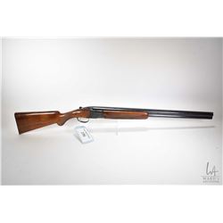 Non-Restricted shotgun Browning model Lightning Superposed, 12 GA 2 3/4" 2 hinge break, w/ bbl lengt