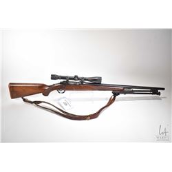 Non-Restricted rifle Ruger model M77, 22-250 cal bolt action, w/ bbl length 24  [Blued barrel and re