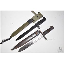 Two bayonet including a Spanish I.N.I Toledo bayonet with scabbard and a Spanish F.N. Toledo bayonet