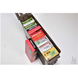 Metal ammunition box and contents including two full 50 count boxes of Remington 380 auto 95 grain,