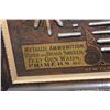 Image 8 : Rare 1890 Winchester cartridge board. Bullet information in gold print with the cartridges directly 
