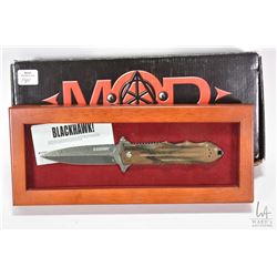 Mod Tactical "Blackhawk" folding knife with Damascus blade, in wooden display