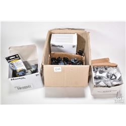 Large selection of trigger locks including new in box Master Lock key lock and a non-keyed trigger l