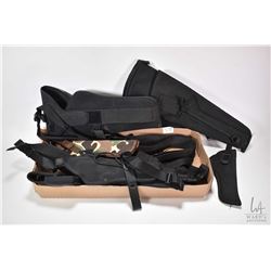 Selection of canvas holsters and gun belts including branded Colt, Kolpin, Sidekick, S&W etc.