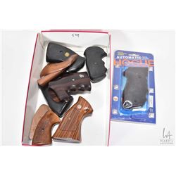 Selection of wood and plastic hand gun grips including S&W, Pachmayr, Sig Sauer etc.