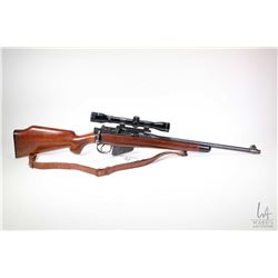Non-Restricted rifle Lee Enfield model Sporterized, .303 Brit ten shot bolt action, w/ bbl length 18