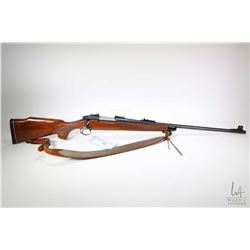 Non-Restricted rifle Remington model 700, 7mm Rem Mag bolt action, w/ bbl length 24" [Blued barrel a