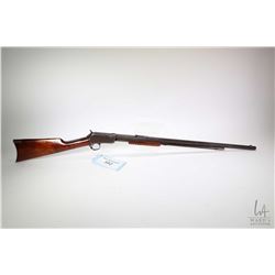 Non-Restricted rifle Winchester model 1890, 22L pump action, w/ bbl length 24  [Blued octagonal barr