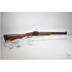 Non-Restricted shotgun/ rifle Chiappo Firearms model Double badger, .22 LR & 20 gauge 3" two shot hi