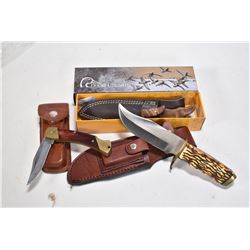 Three collectible knives including a boxed Browning Ducks Unlimited model 521DU with sheath, a Schra