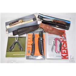 Selection of knives including Schrade Uncle Henry with leather sheath, a Shrade PH2 with sheath in b