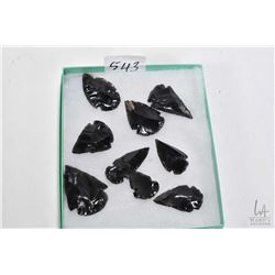 Nine Obsidian arrowheads