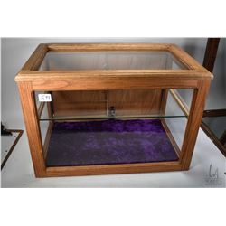 Oak framed showcase/ display cabinet with single glass shelf, glazed top, front and sides plus doubl
