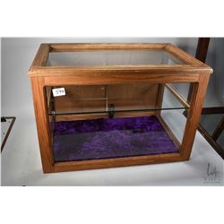 Oak framed showcase/ display cabinet with single glass shelf, glazed top, front and sides plus doubl