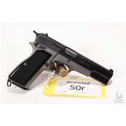 Restricted handgun Browning model Hi- Power, 9mm luger ten shot semi automatic, w/ bbl length 118mm