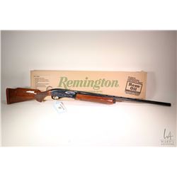 Non-Restricted shotgun Remington model 1100 Classic Trap, 12 gauge 2 3/4" semi automatic, w/ bbl len
