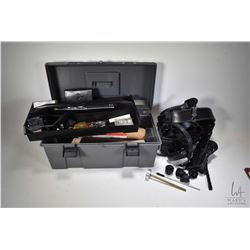 Selection of shooting supplies including gray tool box with assorted speed loaders including Safaril