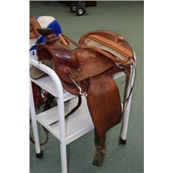 Men's Western Pleasure saddle made by Big Horn Saddlery. Hand carved leather with stock leather seat