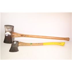 Two axes including a Walters double headed axe and a Sager splitting axe.