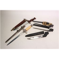 Three Enfield bayonets including a No. 4 MK. I spike bayonet with scabbard, a No. MK. II spike bayon