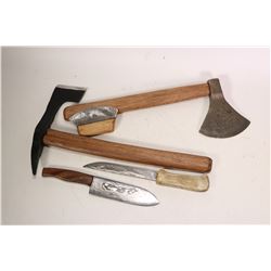 Selection of sharps including wood handled hatchet with Damascus blade, small pick axe, a skinning k