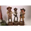 Image 2 : Ceramic cowboy figure, 21" in height and three small resin cowboys approximately 10" in height.