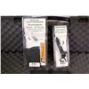Image 2 : Wolverine hard plastic rifle case, a Remington model 700 detachable magazine new in package and a Re