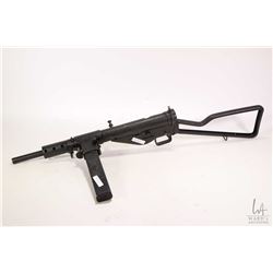 Dewatted Sten Mk II with one stick magazine.