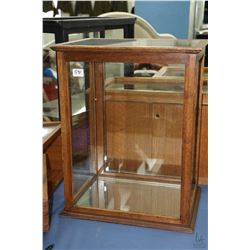 Antique showcase/retail display cabinet with glazed sides, front and top, single shelf and mirrored