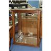 Image 1 : Antique showcase/retail display cabinet with glazed sides, front and top, single shelf and mirrored 