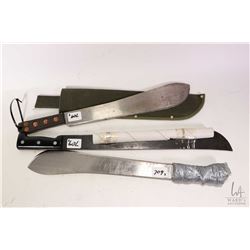 Three machetes, one with canvas sheath.