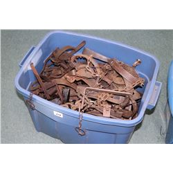 Tub of approximately 40 count of various vintage leg hold traps.