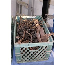 Crate of approximately 40 count of vintage leg hold traps.
