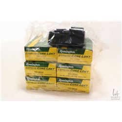 Six 20 count boxes of Remington .300 WSM 150 grain ammunition and metal magazine marked BLR 300 WSM.